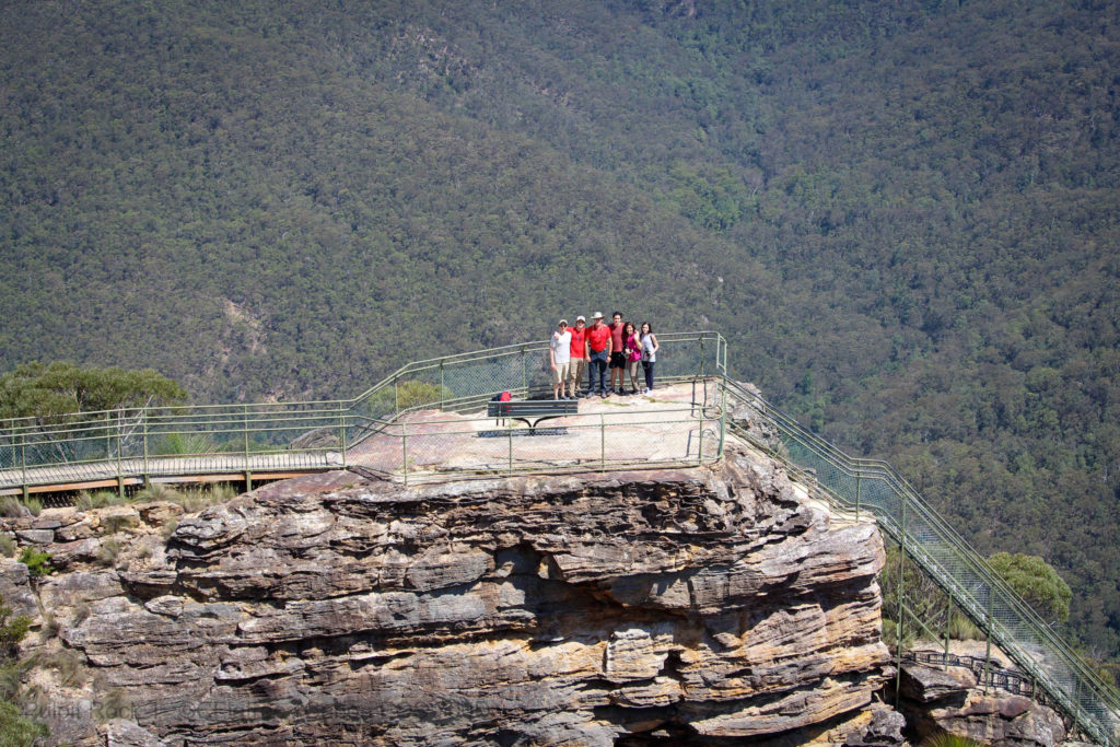 Family taking a photo at Pulpit Rock