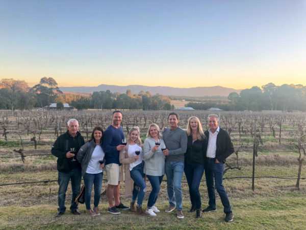 Group at Sunset at Blue Berry Hill with the grapevines