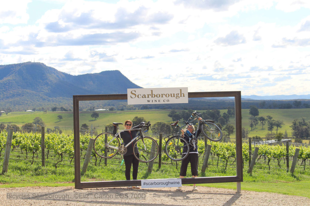 Riders holding up their bikes at Scarborough wines